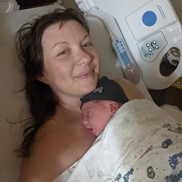 Mary Pawlowski bonds with her son shortly after his birth