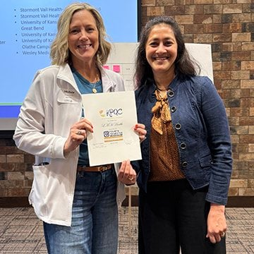 Michele Caldwell receives KPQC award