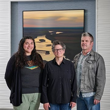 Left to right: Blanca Herrada, Exhibitions Coordinator, Lawrence Arts Center; Lisa Grossman; Ben Ahlvers, Interim Executive Director, Lawrence Arts Center